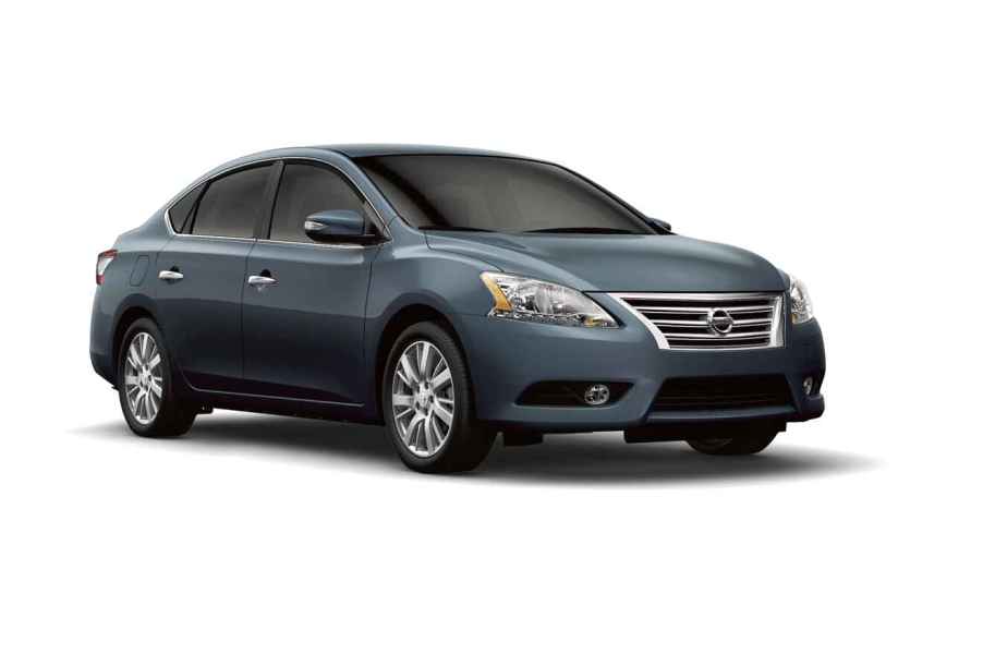 A blue-grey 2015 Nissan Sentra compact sedan parked in right front angle view on a white background