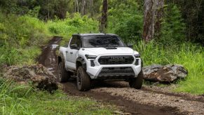 The 2024 Toyota Tacoma on a muddy trail