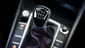 Gearshift lever in a manual transmission Volkswagen Jetta GLI sports sedan.