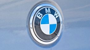 BMW Logo on a light blue car