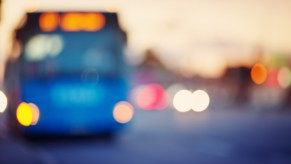 City bus driver using the LED to communicate to bystanders.