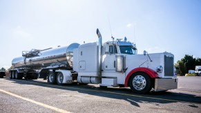 A white semi-truck fuel tanker