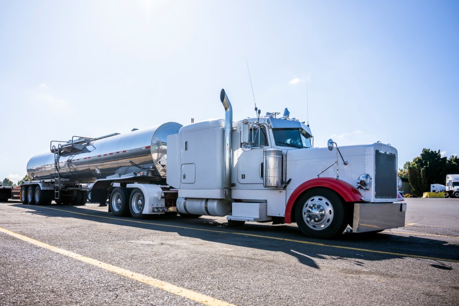 A white semi-truck fuel tanker