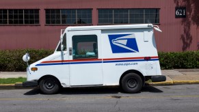 A USPS truck in the city