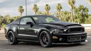 A black 2014 Ford Mustang Shelby GT500 Super Snake parked in right front angle view