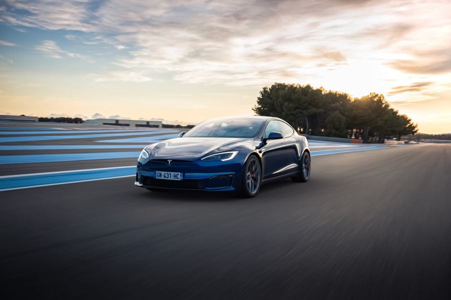 A Tesla Model S Plaid luxury EV takes on the track.