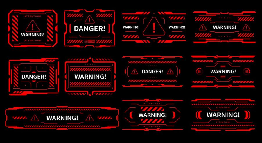 Red HUD warnings and danger symbols on a black screen.