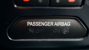 A passenger airbag sign not being illuminated on the dashboard of a car