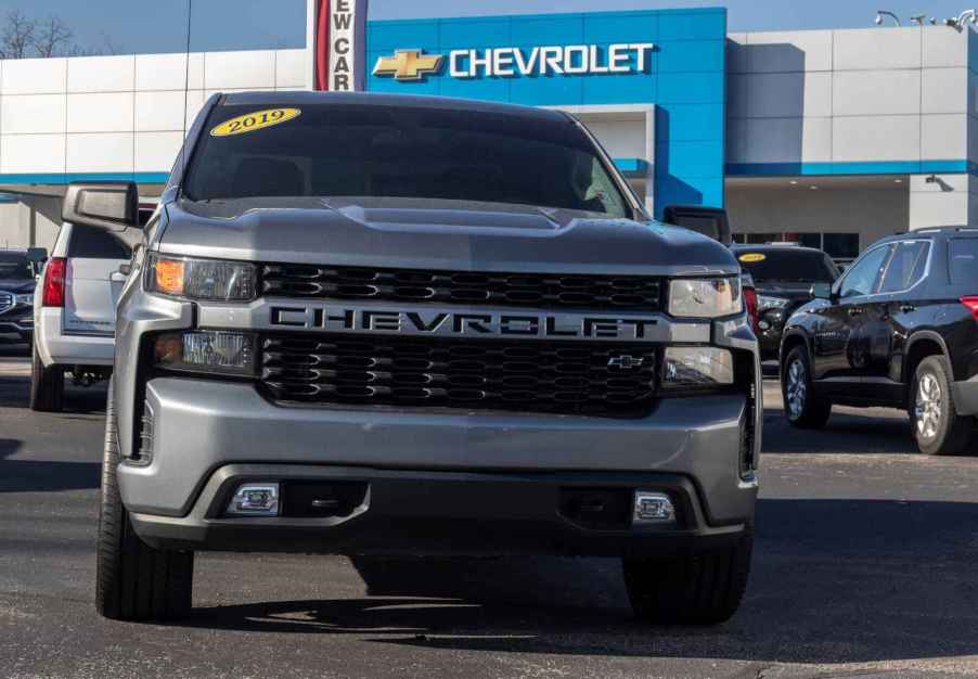 A Chevy Silverado truck parked in a dealership lot