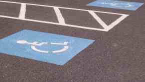 A disabled parking space emblem signaling handicapped parking