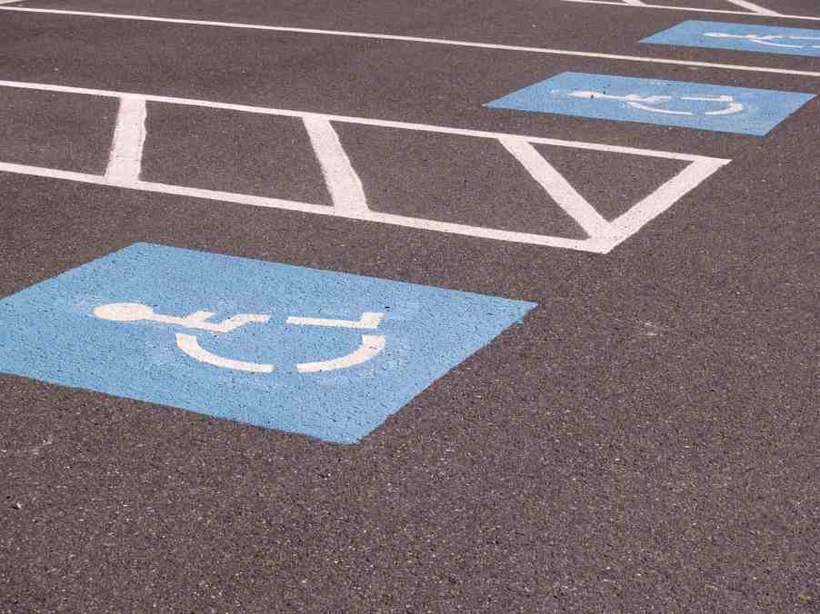 A disabled parking space emblem signaling handicapped parking