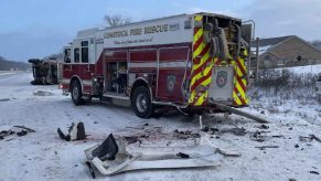 Fire truck after semi collided with it on snowy Michigan highway