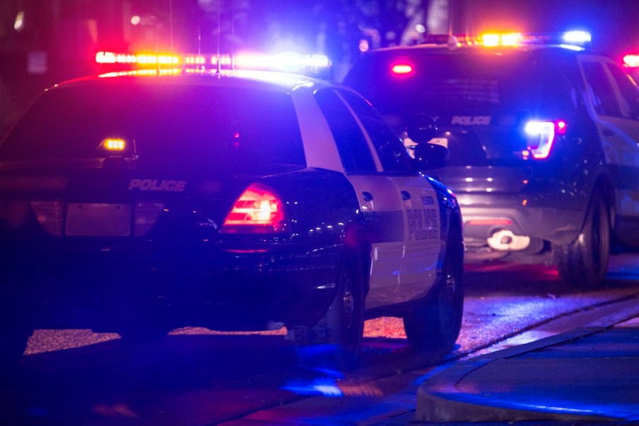 multiple police cars responding to a crime scene