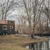 A tiny home by a lake