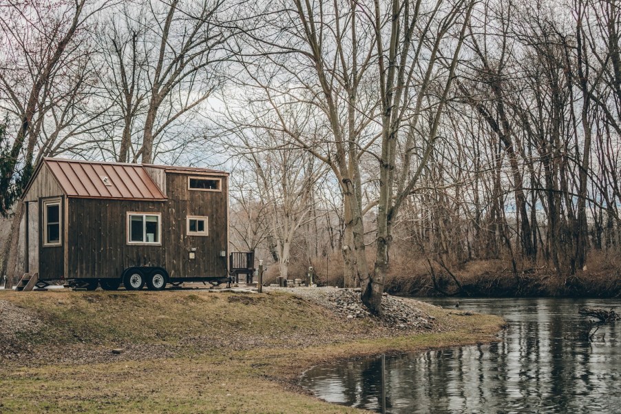 A tiny home by a lake