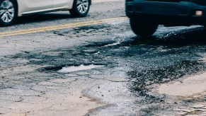 Large pothole in the middle of the road in a highway in Minas Gerais, Brazil