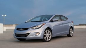 A silver 2012 Hyundai Elantra parked in left front angle view