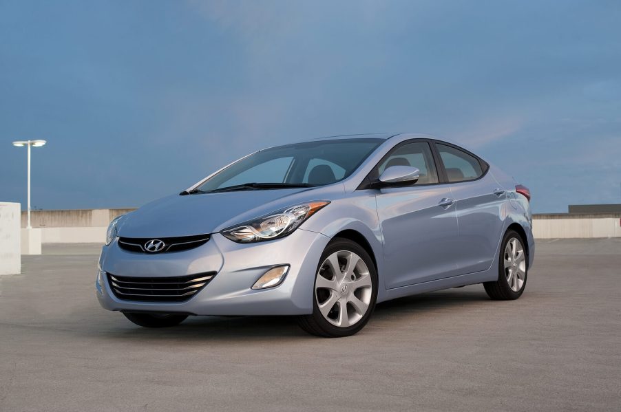 A silver 2012 Hyundai Elantra parked in left front angle view