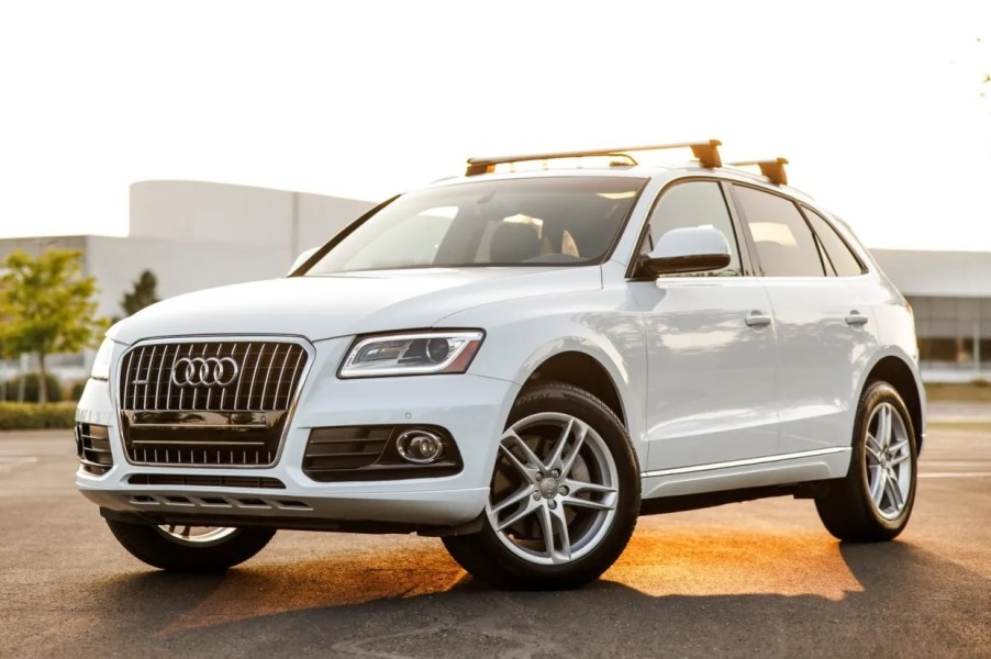 A white 2015 Audi Q5 SUV parked in left front angle view