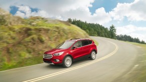 A red 2018 Ford Escape driving