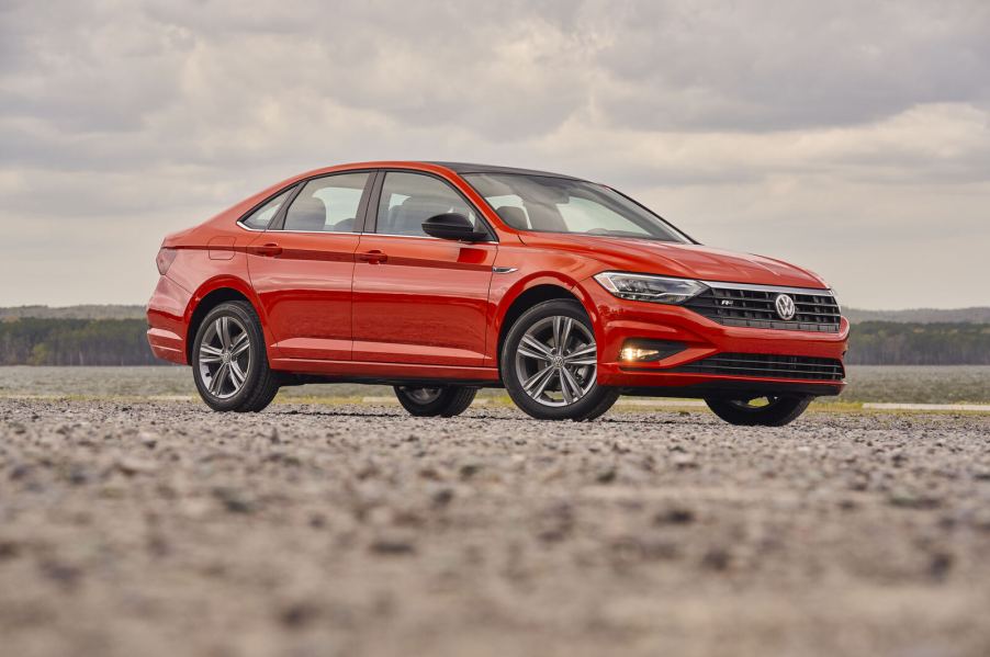 A red 2019 Volkswagen Jetta parked in right front angle view | VW