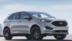 A silver 2020 Ford Edge parked in right front angle view