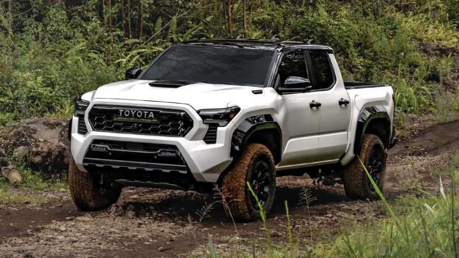 The 2024 Toyota Tacoma on a muddy road