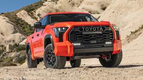 An orange 2024 Toyota Tundra in the sand