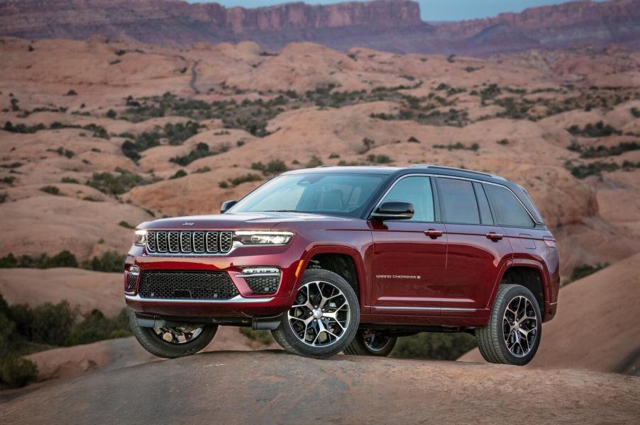 A 2024 Jeep Grand Cherokee parked on top of a desert hill