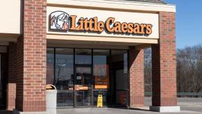 A Little Caesars storefront, like the location where a Kia sedan crashed into the building.