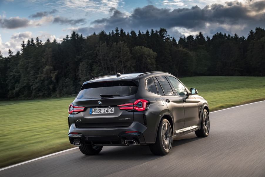 A G01 BMW X3 SUV driving.