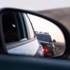 A police SUV behind an unmarked cop car.