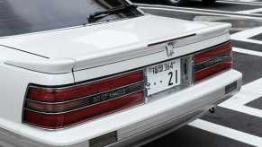 The rear of a white Toyota Soarer GT coupe