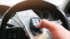 Most Americans are burdened with car notes, and some may wonder when financial institutions report them to credit bureaus.