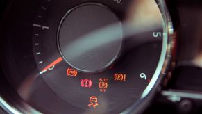 A dashboard lit up with warning lights