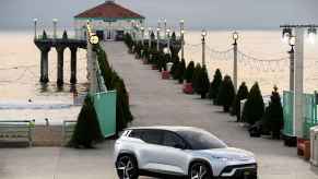 A Fisker Ocean EV SUV parked at a pier entrance in Los Angeles in 2021. The Ocean was the Consumer Reports car test team's least favorite fleet car of 2024