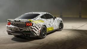 A Ford Mustang EcoBoost RTR in its camouflage livery.