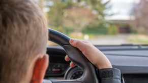 A child driving a car