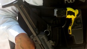 A police officer with a taser