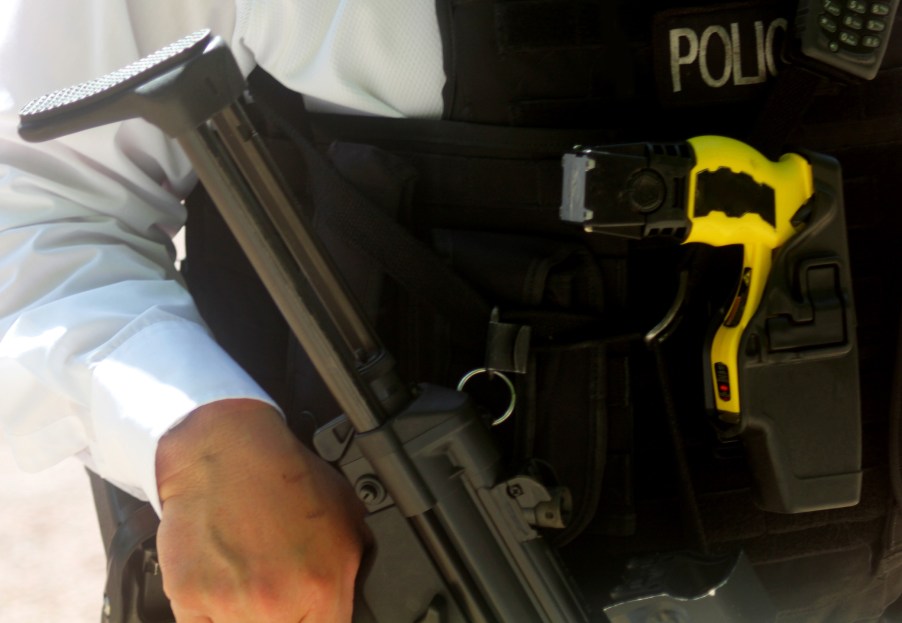 A police officer with a taser