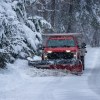 A snowplow clearing the road