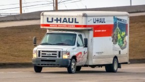 A U-Haul truck on the road