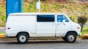 A white van parked in the city