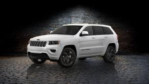 A white 2014 Jeep Grand Cherokee