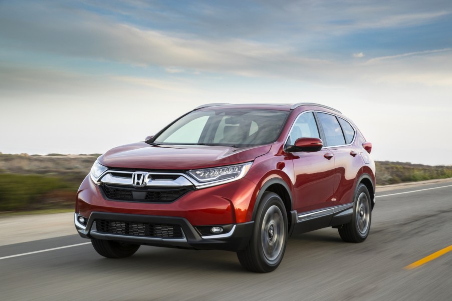 A red 2017 Honda CR-V driving