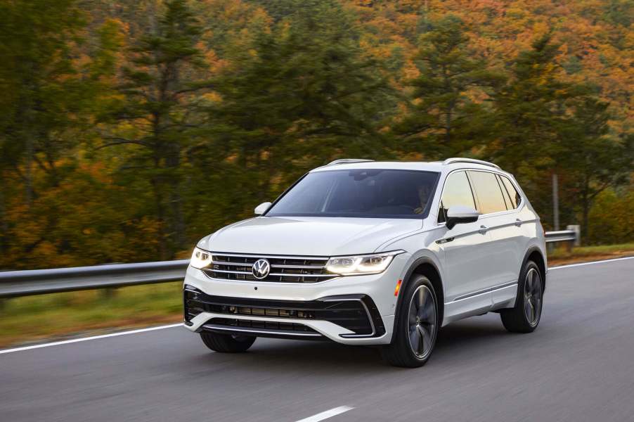 A white 2022 Volkswagen Tiguan SUV driving