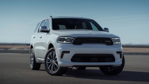 A white 2024 Dodge Durango SUV parked in right front angle view