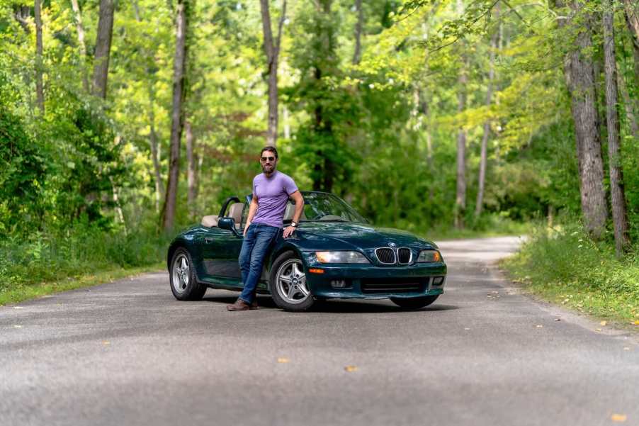 Automotive journalist Henry Cesari and his BMW Z3 on a country road in Michigan.