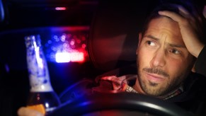 A man in Connecticut was found to be driving while under the influence and the report says he was asleep at the wheel.