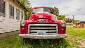 Red GMC pickup truck from after the Grabowsky motor company era.